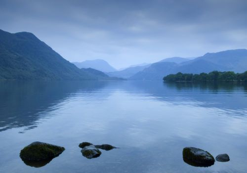 View across Ullswater from the water’s edge, Ullswater, Cumbria, England. View across Ullswater from the water’s edge, Ullswater, Cumbria, England.