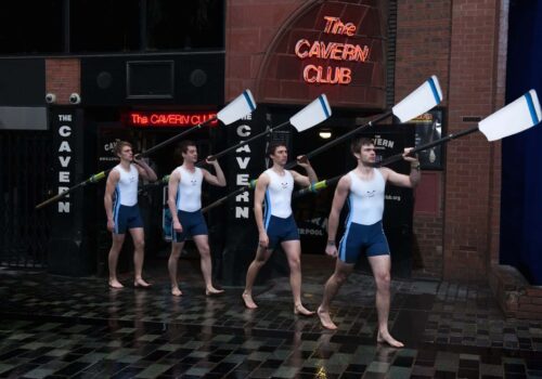 Four male rowers outside The Cavern Club, Liverpool, England, UK Four male rowers outside The Cavern Club, Liverpool, England, UK