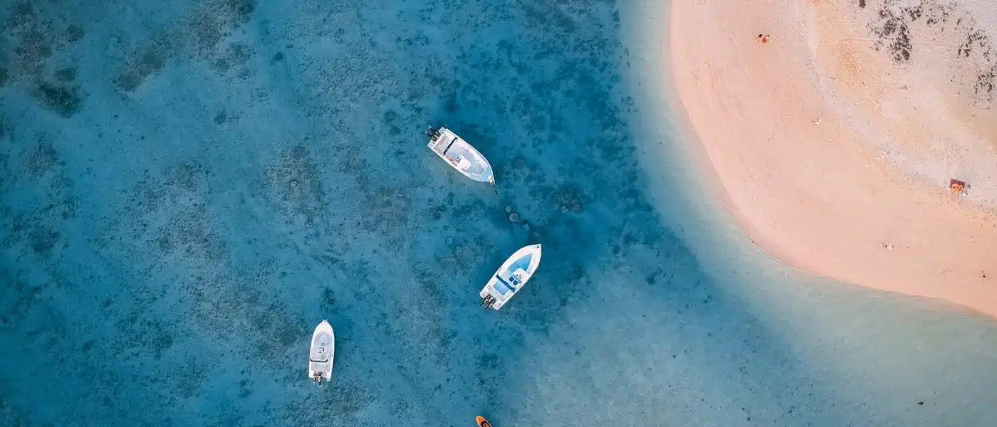 Snorkeler above coral on the east coast reef of Mauritius