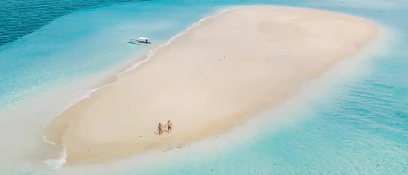 Private dhow anchored alone off an empty sandbank