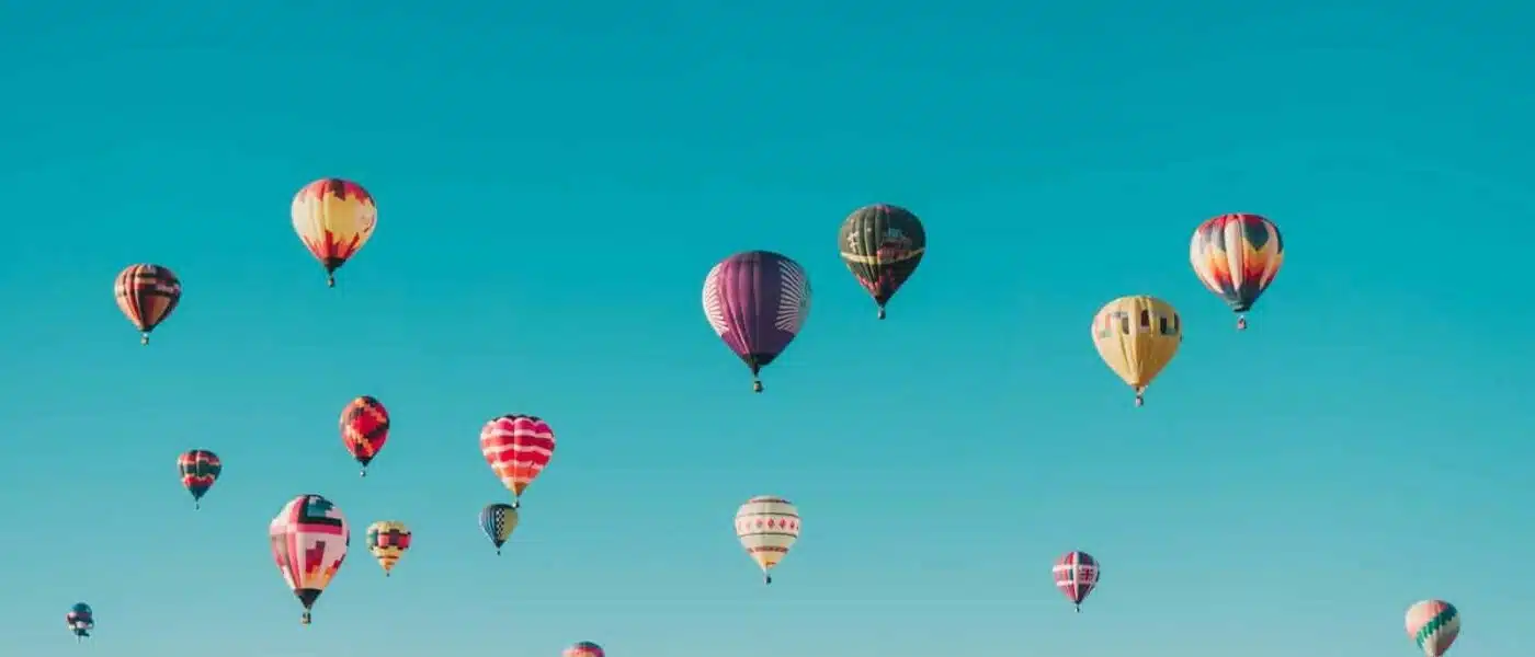 Sun-bleached ridges above the Valley of the Kings seen from a balloon