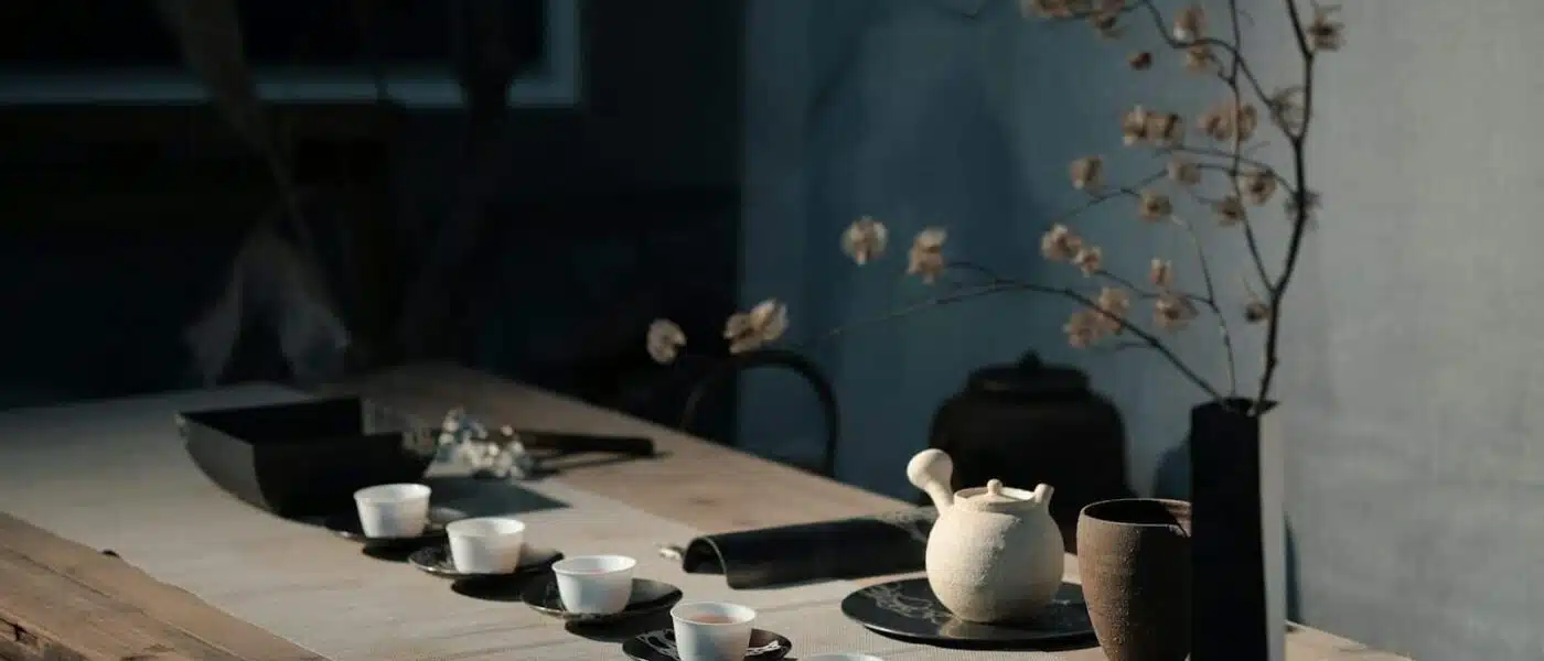 Guest turning a chawan bowl before drinking matcha