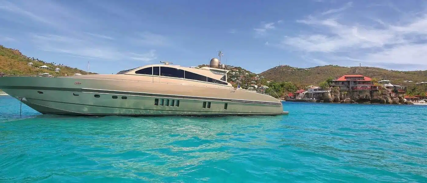 Lunch served on the deck of a yacht anchored off Colombier