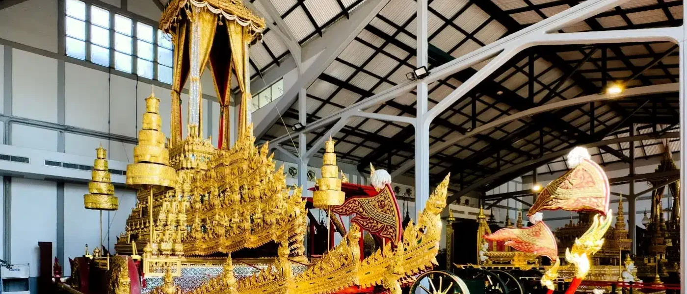 Towering gilded royal funeral chariots in the Funeral Chariot Hall