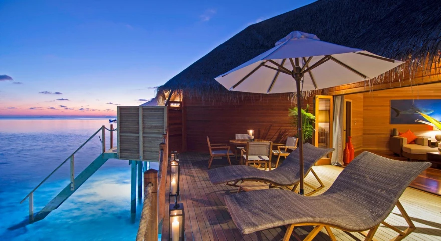 Overwater villa terrace at V Villas Maldives at Mirihi at dusk, used for stargazing