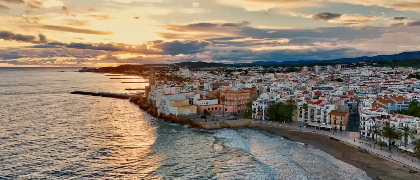 An aerial view of a beach and a city