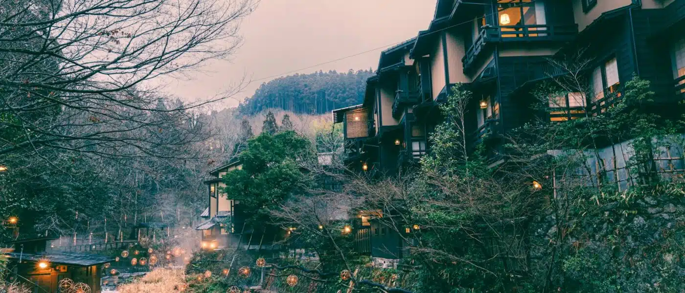 Private hinoki bath for two with steam rising above the water