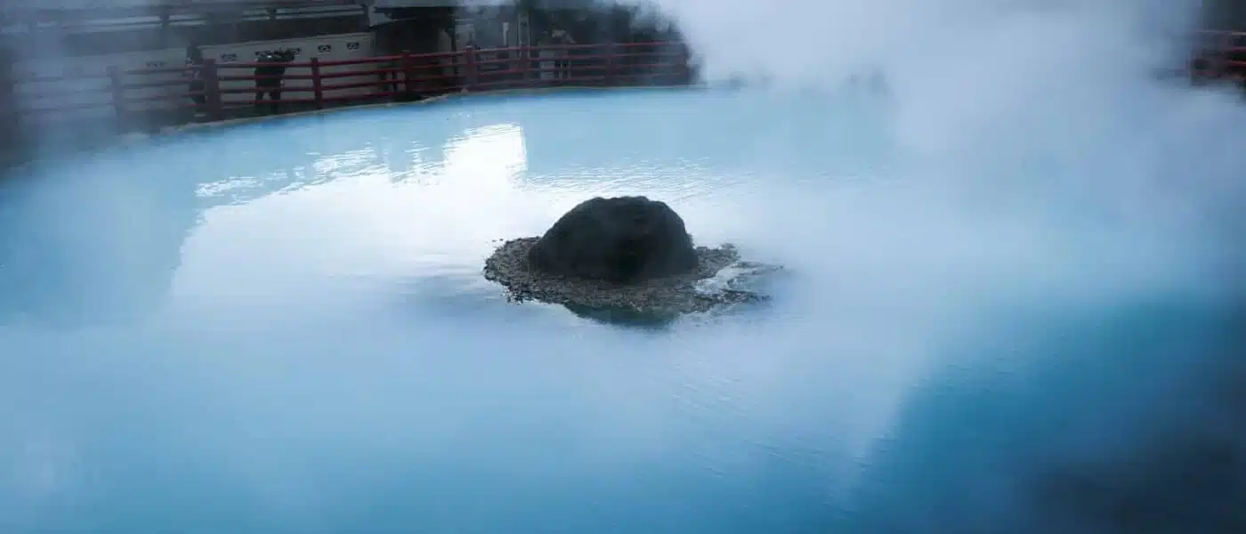 Empty stone bath inside a Kinosaki bathhouse after closing