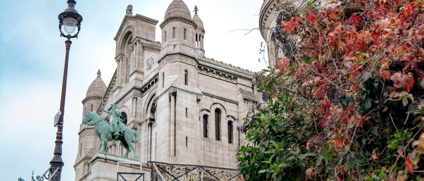 Art historian guiding a small group along a Montmartre lane