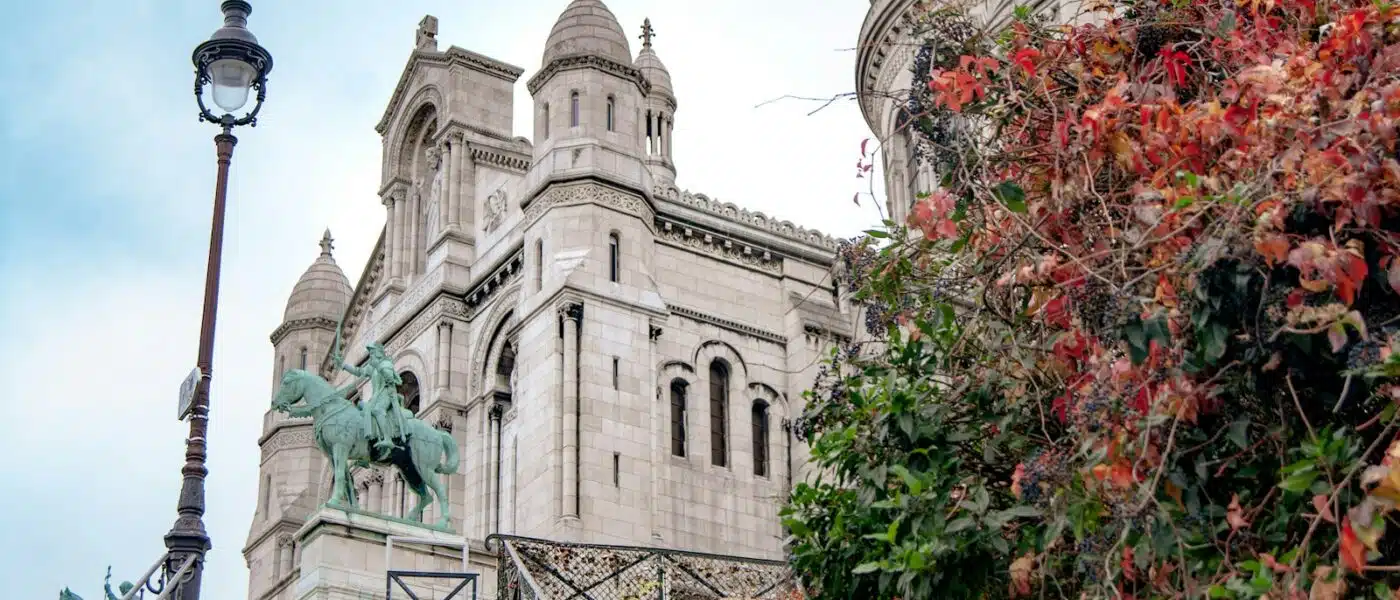 Art historian guiding a small group along a Montmartre lane