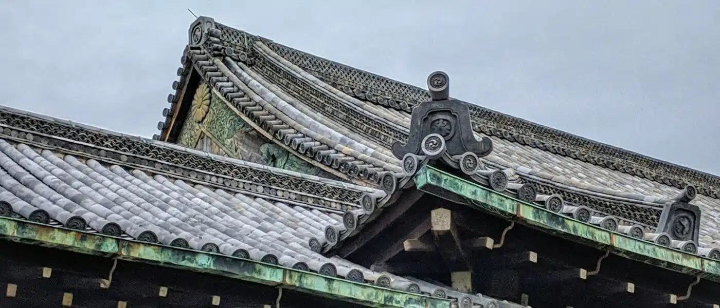 Layered tile roofs and white plaster walls of Nijo Castle