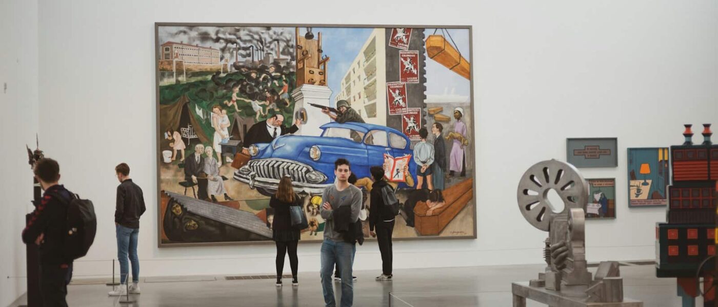 Visitors dwarfed by the vast Turbine Hall at Tate Modern