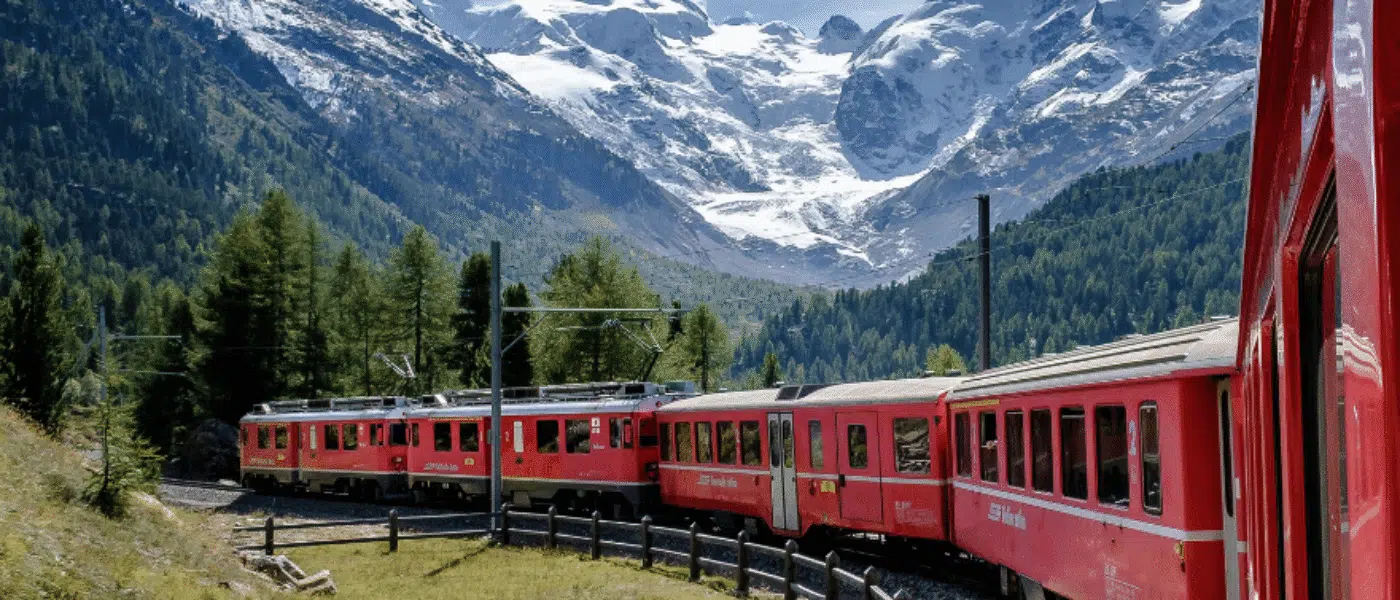 Bernina Express beside Lago Bianco near Ospizio Bernina