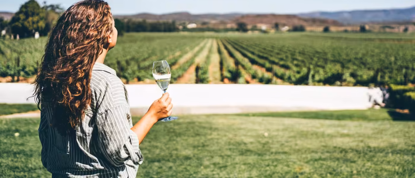 Owner-winemaker pouring at a small Franschhoek estate