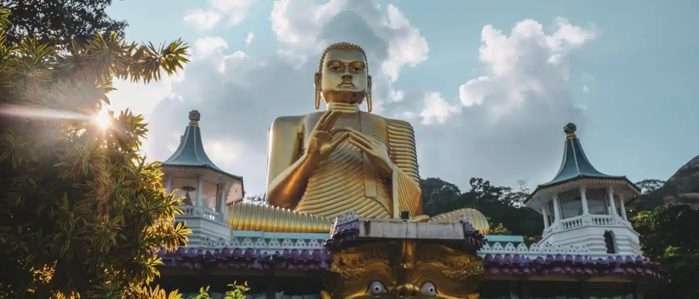 Mural of the Buddha surrounded by disciples in Cave 4