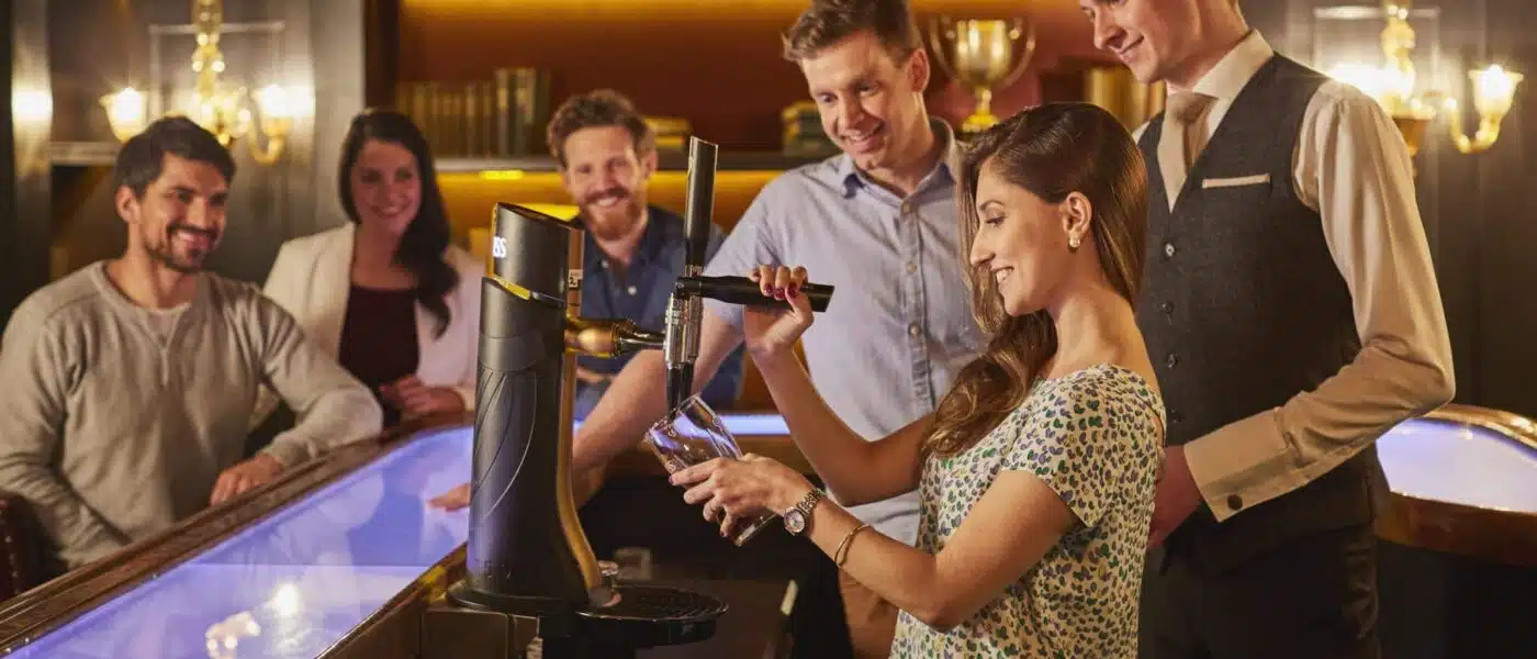 Connoisseur guiding a small group through a Guinness tasting
