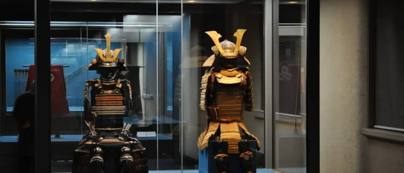 Samurai armor with lacquered plates displayed in the Honkan