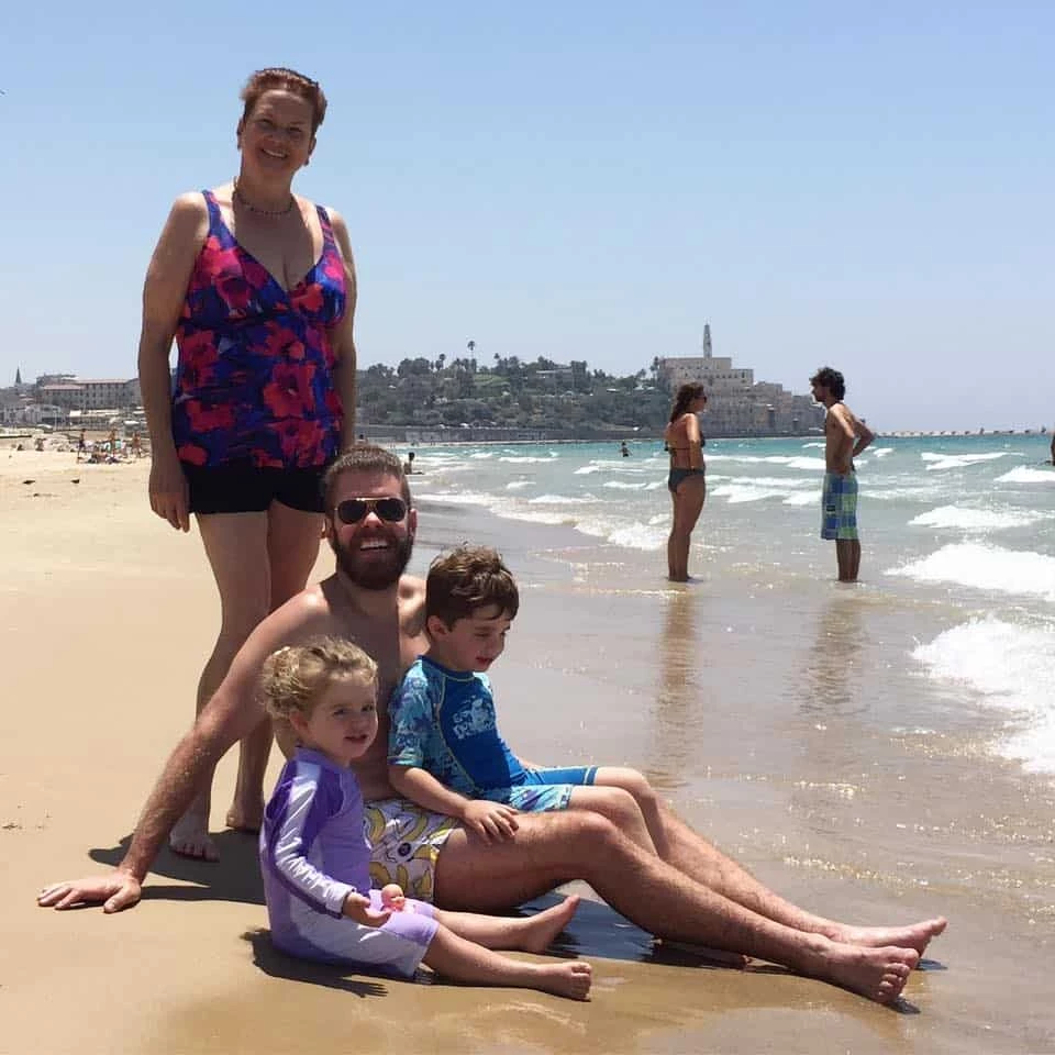 Gay blogger Perez Hilton and his family on a beach